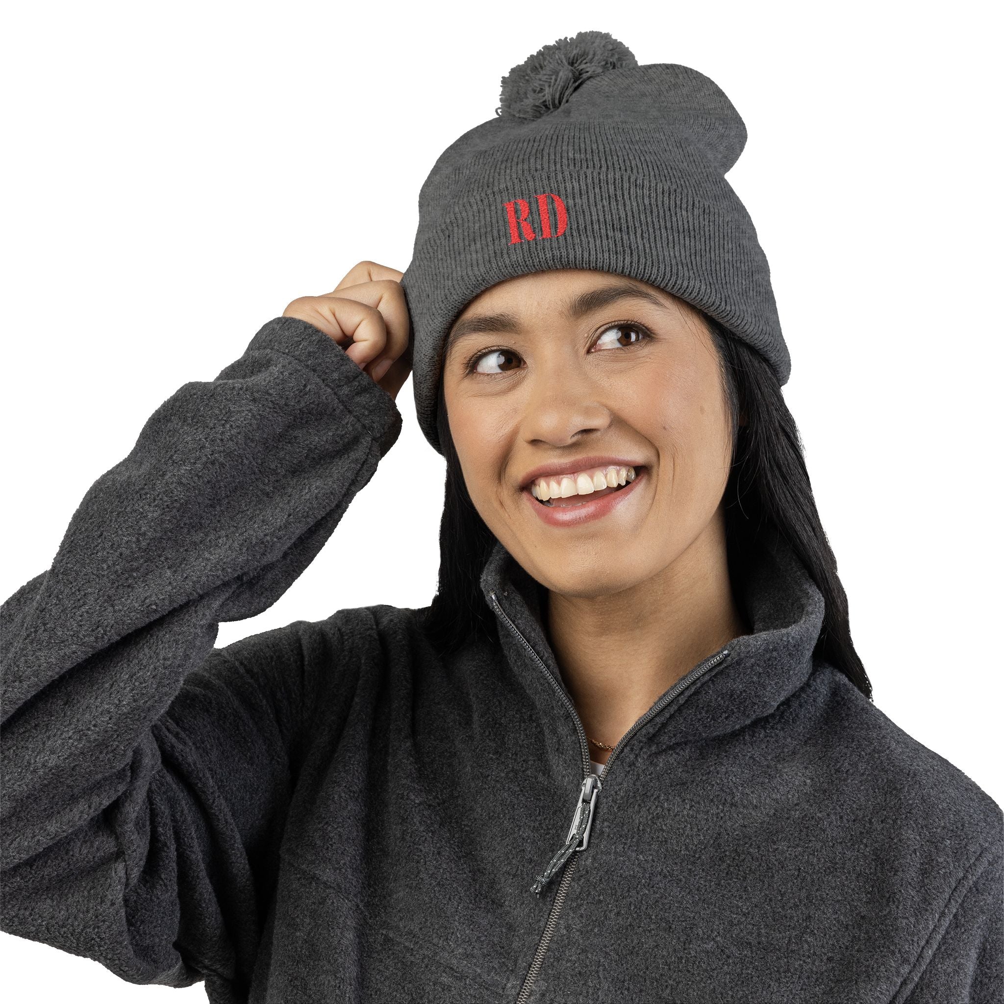 Knitted hat with the letters RD for Dominican Republic and pom-pom embroidery: the perfect winter accessory.