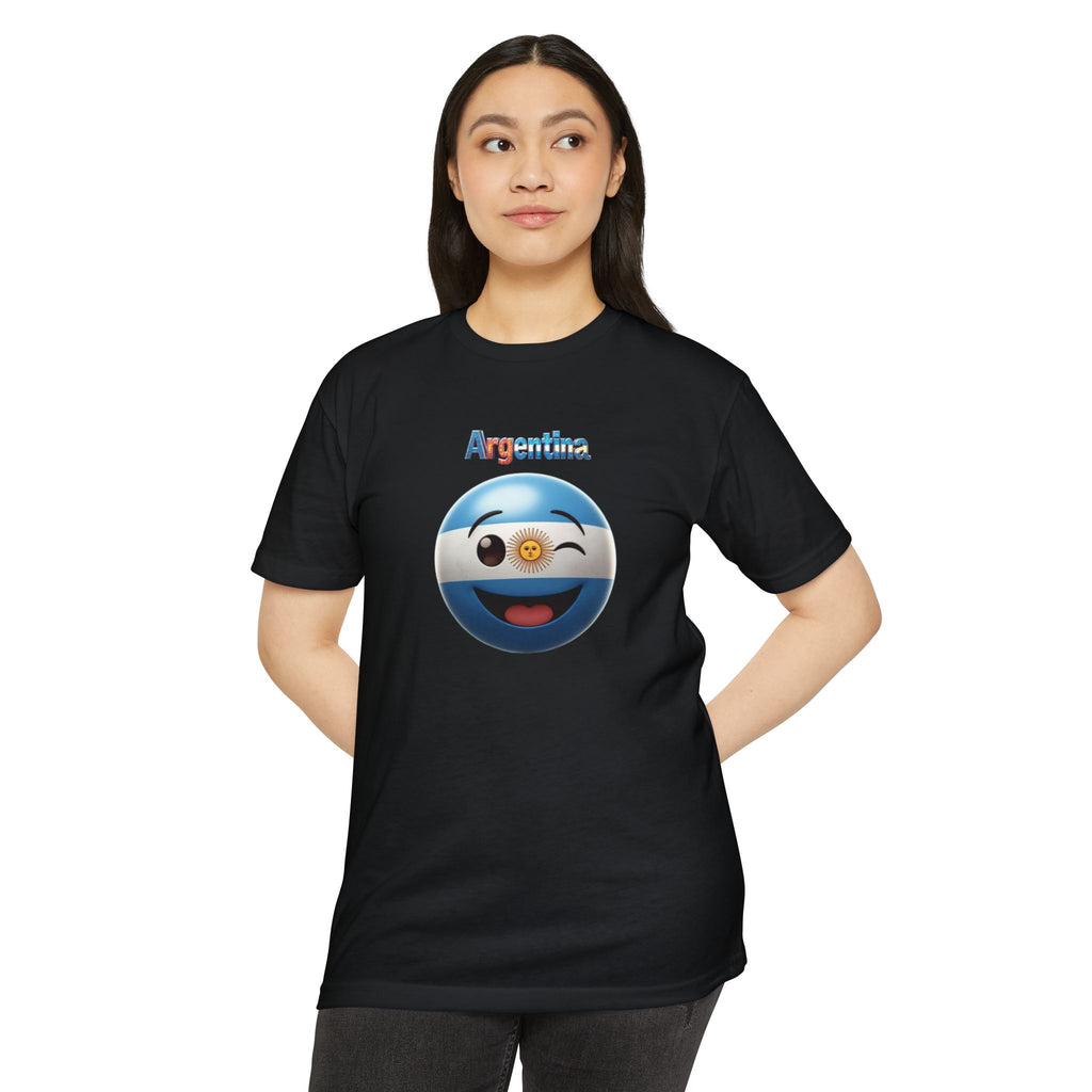 Camiseta unisex CVC con emoji guiñando y con la bandera de Argentina pintada en la cara