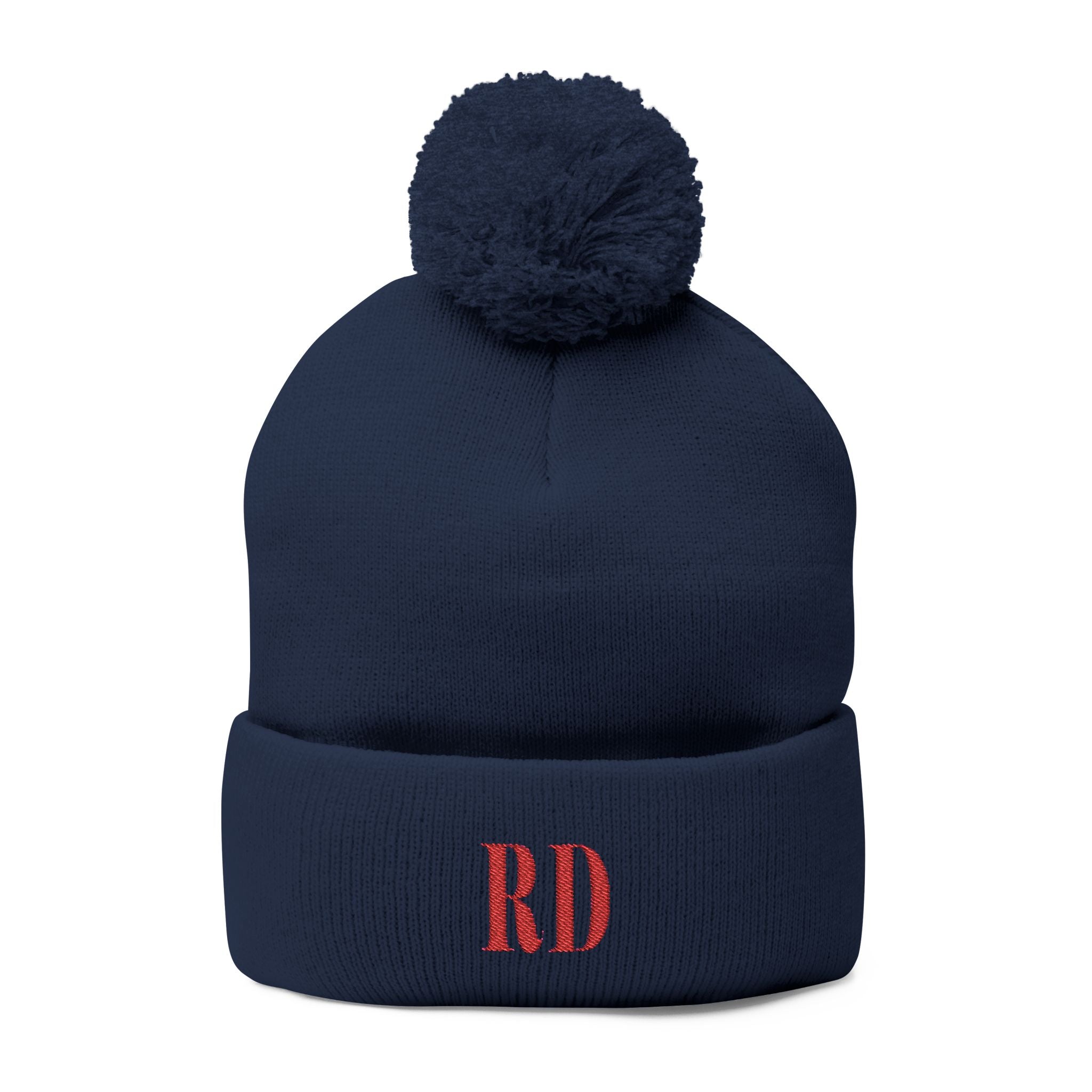 Gorro de punto con las letras RD de República Dominicana y bordado de pompones: el accesorio perfecto para el invierno.