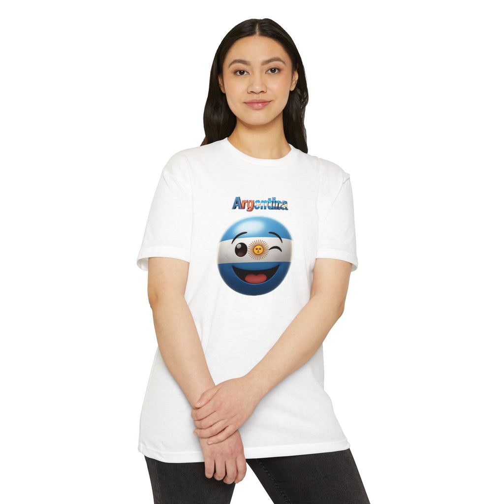 Camiseta unisex CVC con emoji guiñando y con la bandera de Argentina pintada en la cara