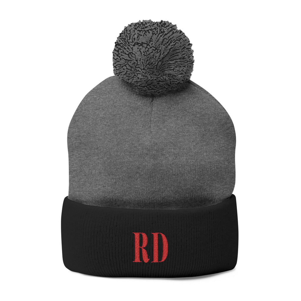 Knitted hat with the letters RD for Dominican Republic and pom-pom embroidery: the perfect winter accessory.